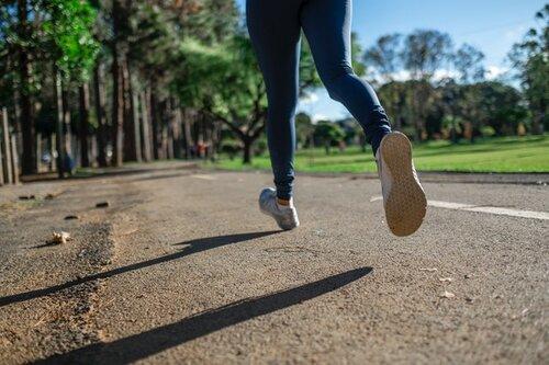 Walk or run against traffic so you can be better seen by oncoming cars. Be sure not to get blinded by the lights though.